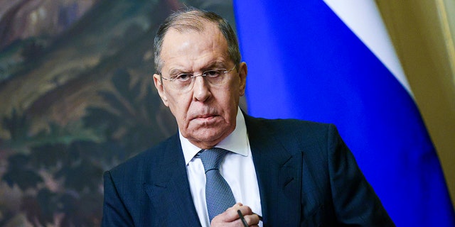 Russian Foreign Minister Sergey Lavrov pauses during a news conference in Moscow, Nov. 30, 2021.