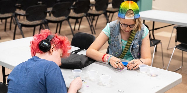 Teens participate in a library event held by the Prince George's County Memorial Library System in Maryland.