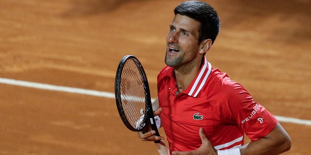 FILE - Serbia's Novak Djokovic celebrates after defeating Italy's Lorenzo Sonego in their semifinal match at the Italian Open tennis tournament, in Rome, May 15, 2021. Djokovic won 6-3 6-7 6-2 and will play Rafael Nadal in the final. Novak Djokovic is ready to move on from the controversy surrounding his refusal to get vaccinated against COVID-19.