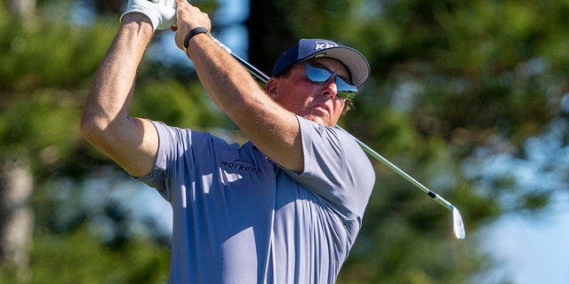 Phil Mickelson hits a tee shot on the second hole during the second round of the Sentry Tournament of Champions golf tournament at Kapalua Resort — The Plantation Course in Maui Jan. 7, 2022.