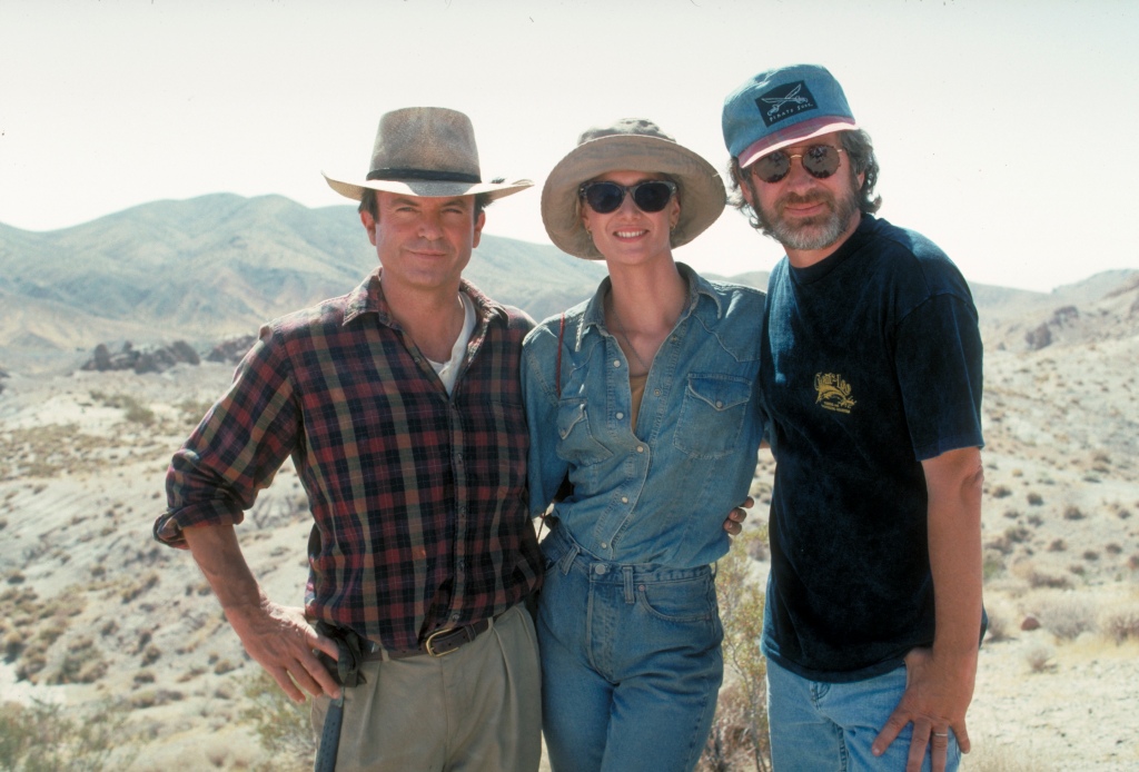 From left to right, actors Sam Neill and Laura Dern pose with American director Steven Spielberg in a publicity still for the film 'Jurassic Park', 1993. (Photo by Murray Close/Getty Images)