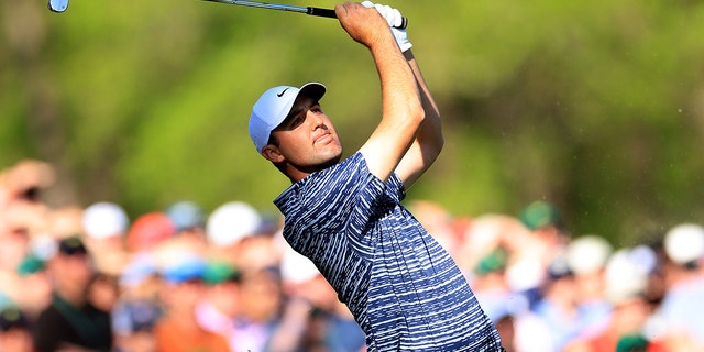 Scottie Scheffler plays his shot from the 12th tee during the final round of the Masters at Augusta National Golf Club on April 10, 2022 in Augusta, Georgia.