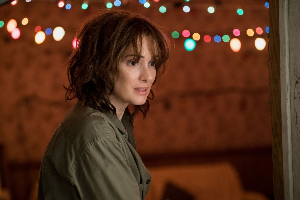 Winona Ryder as Joyce Byers in a fatigue jacket on the set of "Stranger Things"