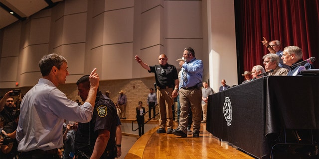 Democratic gubernatorial candidate Beto O'Rourke interrupts a press conference held by Texas Gov. Greg Abbott following a shooting yesterday at Robb Elementary School which left 21 dead including 19 children, on May 25, 2022 in Uvalde, Texas.