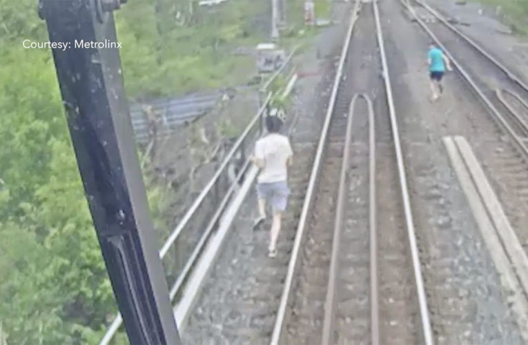 Two Young People Trespassing a Rail Bridge in Toronto Come Within Seconds Of Serious Injury