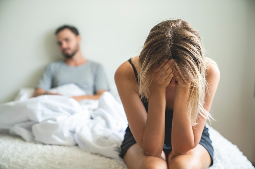 Woman and man in bed