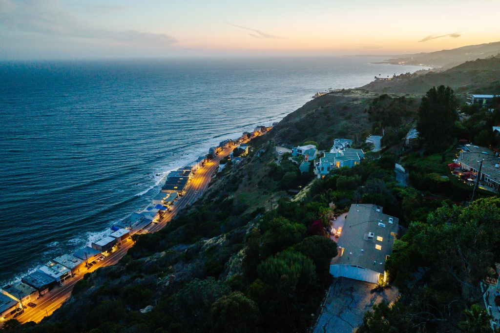 The home sits on a blufftop overlooking the ocean.