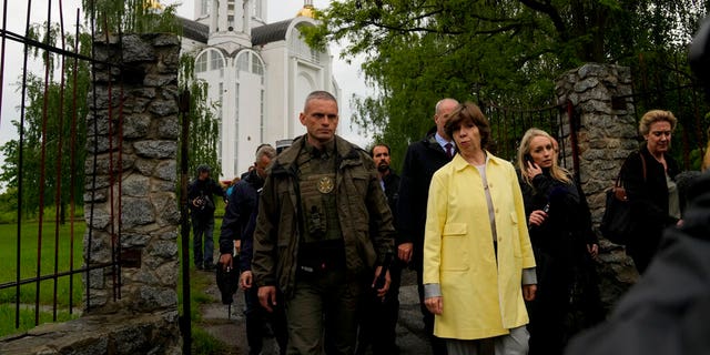 French Foreign Minister Catherine Colonna visits Bucha's church, on the outskirts of Kyiv, Ukraine, Monday, May 30, 2022. 