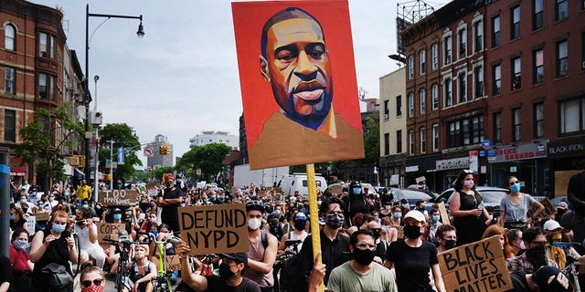 Protesters march in downtown Brooklyn on June 5, 2020, over the killing of George Floyd by a Minneapolis Police officer. 