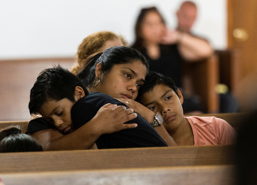 Worshipers gather to sing and pray at Primera Iglesia Bautista, two days after the mass shooting in Uvalde.