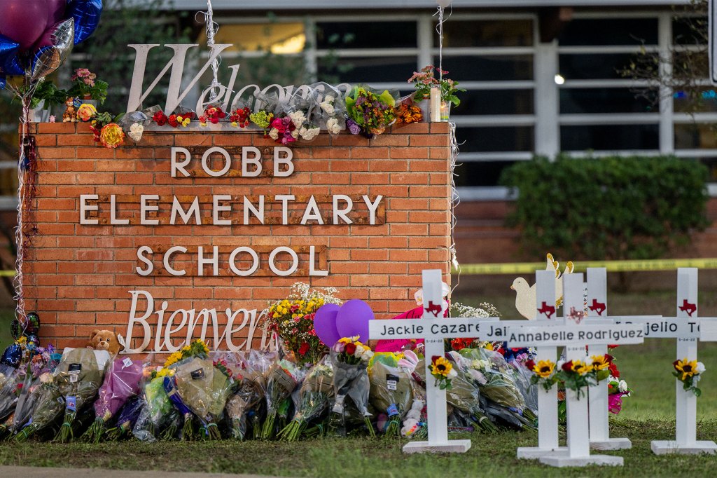 A memorial was set up around the Robb Elementary School sign