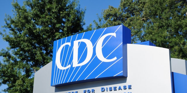 Atlanta, Georgia, USA - August 28, 2011: Close up of entrance sign for Centers for Disease Control and Prevention. Sign located near the 1700 block of Clifton Road in Atlanta, Georgia, on the Emory University campus. Vertical composition. 