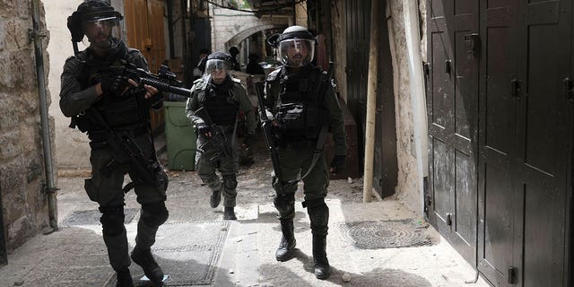 Israeli police is deployed in the Old City of Jerusalem, Sunday, April 17, 2022. Israeli police clashed with Palestinians outside Al-Aqsa Mosque after police cleared Palestinians from the sprawling compound to facilitate the routine visit of Jews to the holy site and accused Palestinians of stockpiling stones in anticipation of violence. 