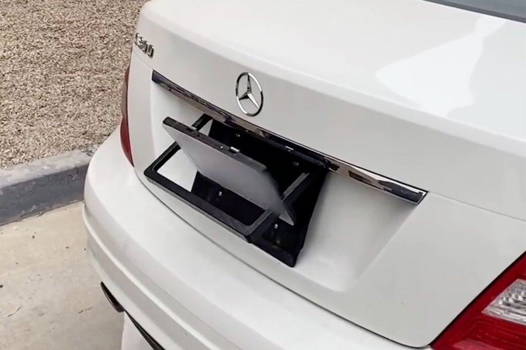 Rear license plate being flipped around backwards