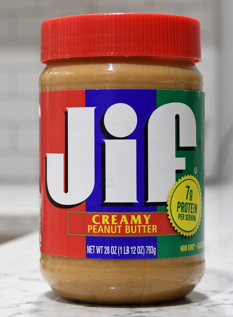 a jar of Jif peanut butter is seen displayed