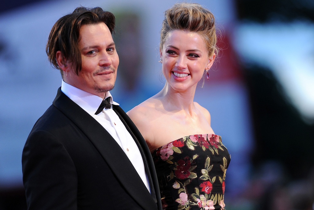 Depp and Heard are pictured together in 2015. Depp is suing Heard over a 2018 Washington Post op-ed that the actress wrote, in which she claimed to be a victim of sexual violence. 