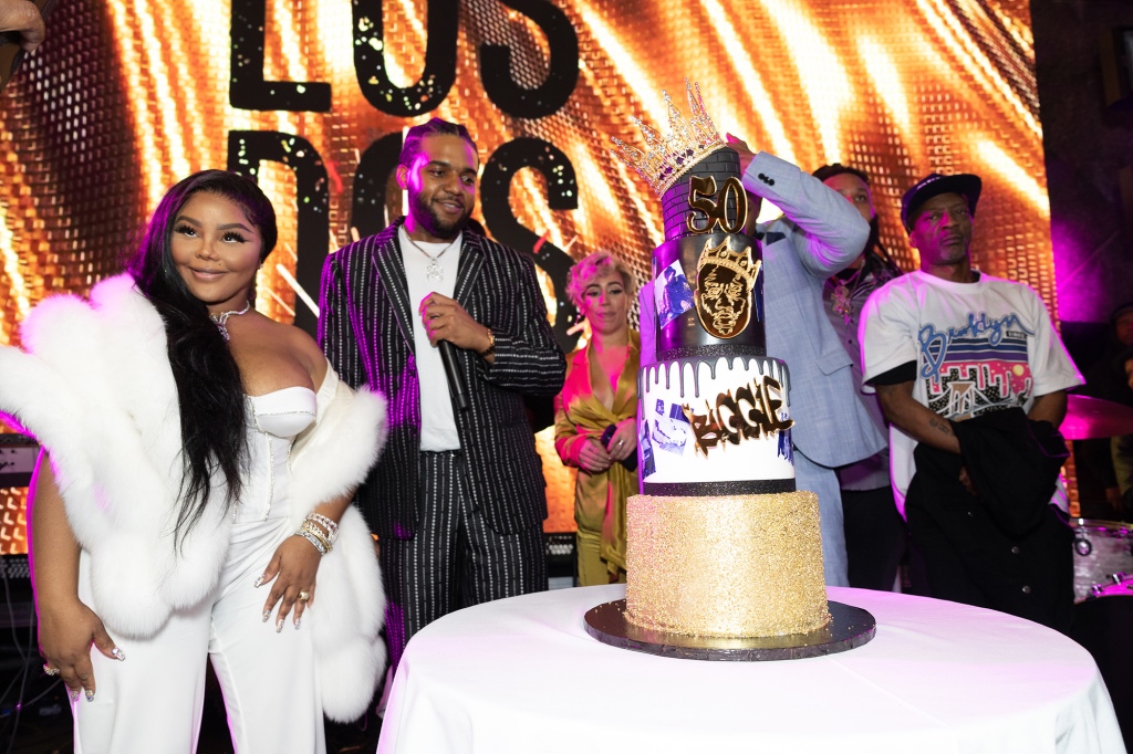 Kim and Biggie's son, CJ Wallace, celebrated the late rapper's 50th birthday with a gigantic, ornate layered cake. 
