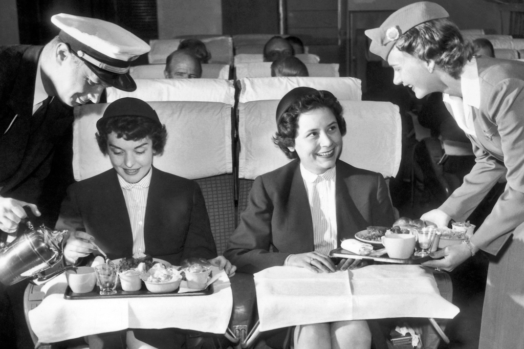 Lufthansa flight attendants being served at the Pan American World Airways stewardess school in Long Island in 1960. 