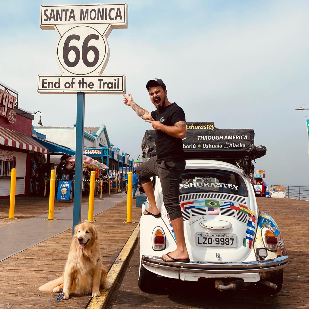 Jesse Koz posing with his Golden Retriever, Shurastey, on Santa Monica Blvd