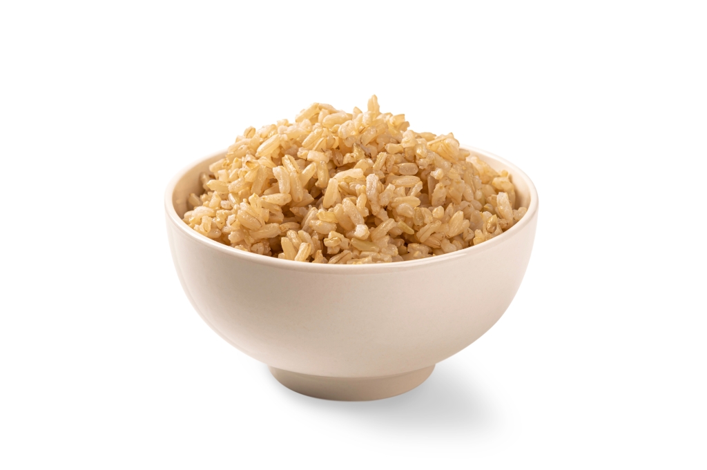 A bowl is filled with brown rice.