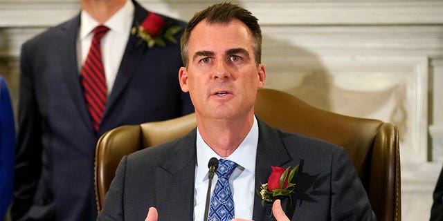 Oklahoma Gov. Kevin Stitt speaks at a signing ceremony to sign into law a bill, Tuesday, April 12, 2022, in Oklahoma City. (AP Photo/Sue Ogrocki, File)