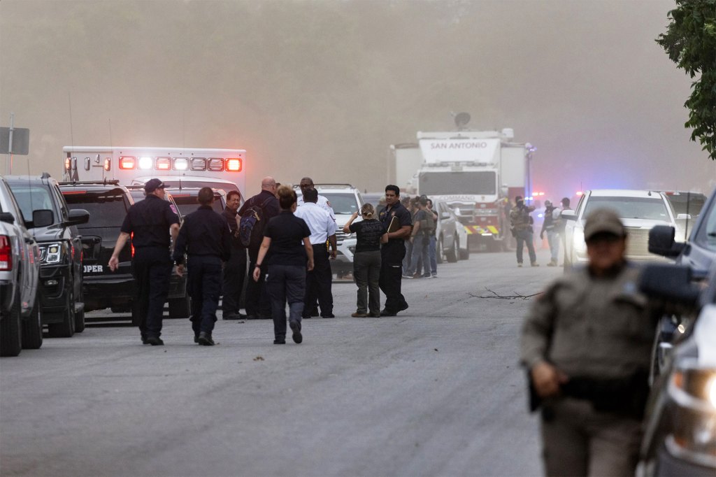 Law enforcement work the scene after a mass shooting at Robb Elementary School in Uvalde, Texas.