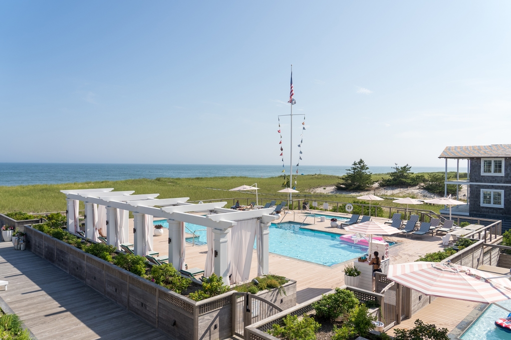 Exterior shot of the pool at the Hamptons club.