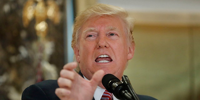 President Donald Trump speaks to the media in the lobby of Trump Tower, Tuesday, Aug. 15, 2017 in New York. (AP Photo/Pablo Martinez Monsivais)