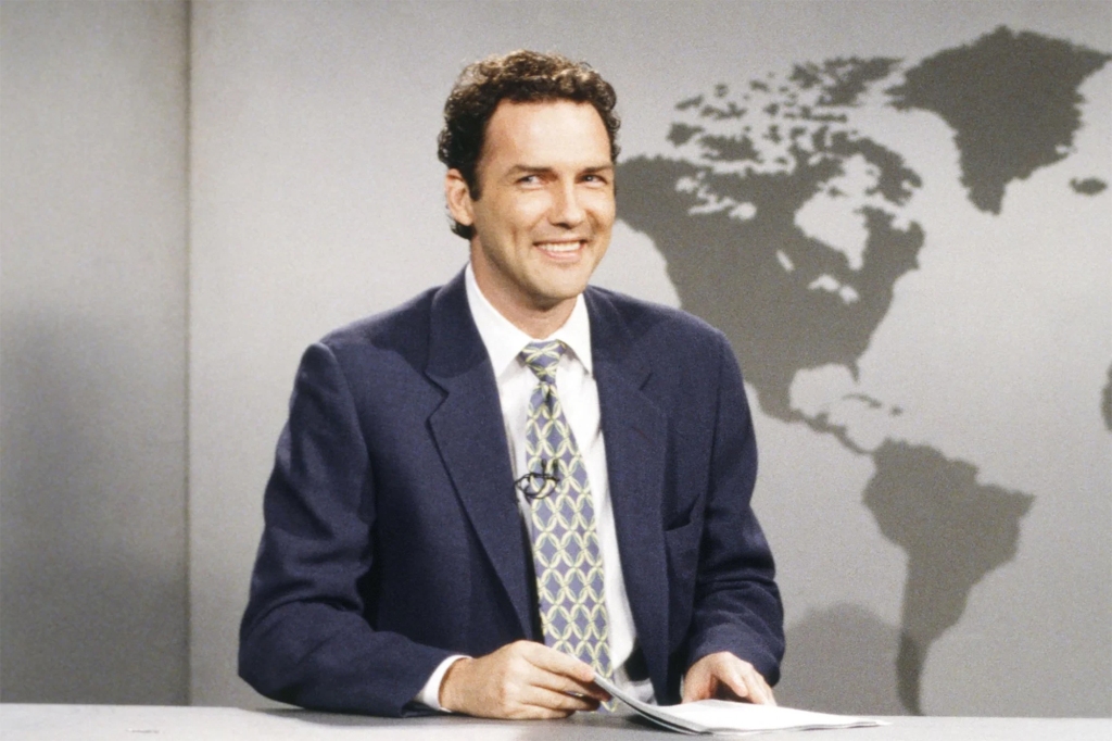 Norm Macdonald on the Weekend Update desk on SNL.