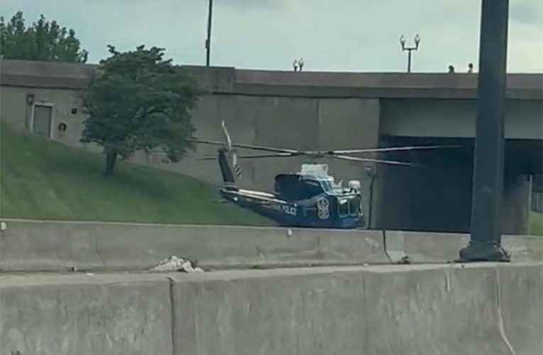 US Parks Police helicopter lands on DC highway to rescue officer