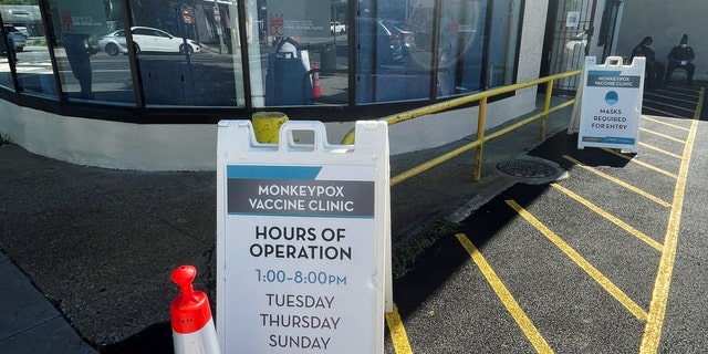 Workers sit outside of D.C. Health's first monkeypox vaccination clinic, which is administering the first Jynneos vaccine doses distributed in the U.S. capital, in Washington, June 28, 2022.