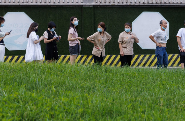 Beijing residents asked to wear monitoring bracelets to enforce COVID quarantine, prompting outcry