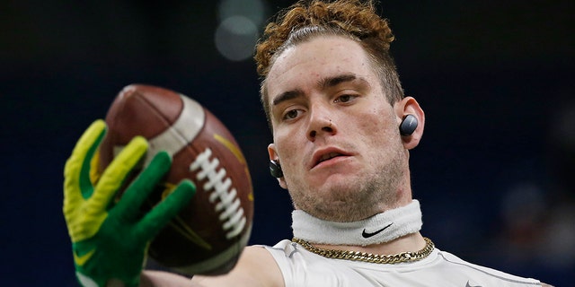 Spencer Webb of the Oregon Ducks catches a pass before the start of a game against the Oklahoma Sooners in the Valero Alamo Bowl at the Alamodome Dec. 29, 2021, in San Antonio, Texas.