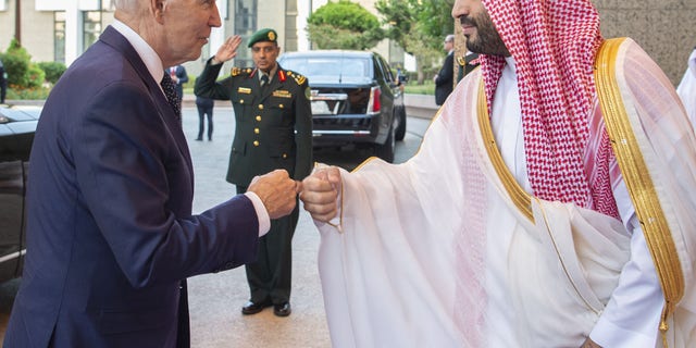 US President Joe Biden (L) being welcomed by Saudi Arabian Crown Prince Mohammed bin Salman (R) at Alsalam Royal Palace in Jeddah, Saudi Arabia on July 15, 2022. 