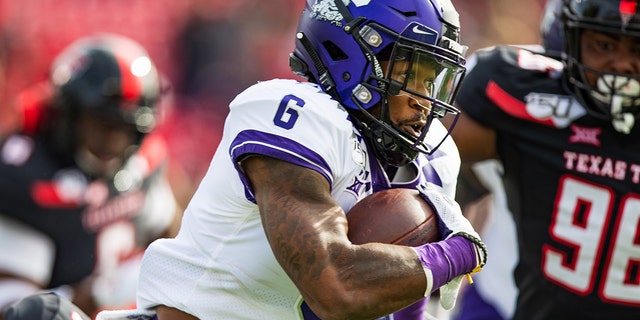 Running back Darius Anderson #6 of the TCU Horned Frogs runs the ball during the first half of the college football game against the Texas Tech Red Raiders on Nov. 16, 2019 at Jones AT&amp;T Stadium in Lubbock, Texas.