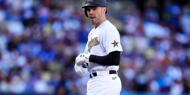 National League All-Star Freddie Freeman of the Los Angeles Dodgers walks off the field after grounding out against the American League All-Stars during the third inning of an MLB All-Star baseball game at Dodger Stadium in Los Angeles on Tuesday, July 19, 2022. 