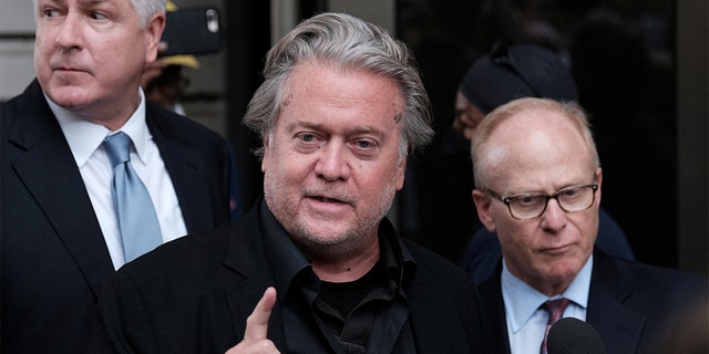 Former Trump White House chief strategist Steve Bannon speaks with the media at the U.S. District Court in Washington, July 21, 2022. 