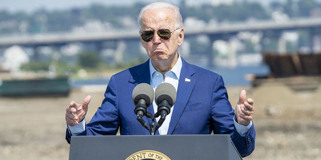 President Joe Biden speaks at the former Brayton Point Power Station in Massachusetts, announcing executive action to confront climate change.