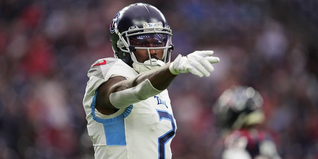 Julio Jones of the Tennessee Titans gets set against the Houston Texans during an NFL game at NRG Stadium in Houston, Texas, on Jan. 9, 2022.