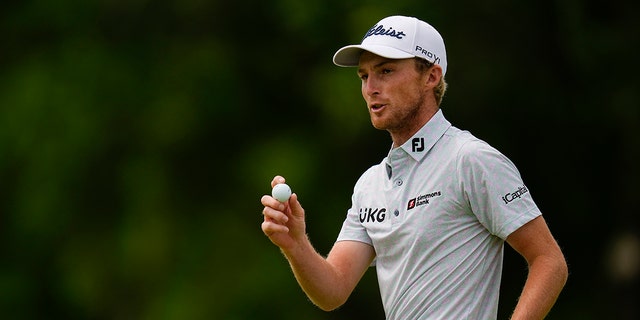 Will Zalatoris waves after making a putt during the PGA Championship at Southern Hills Country Club, May 22, 2022, in Tulsa, Oklahoma.