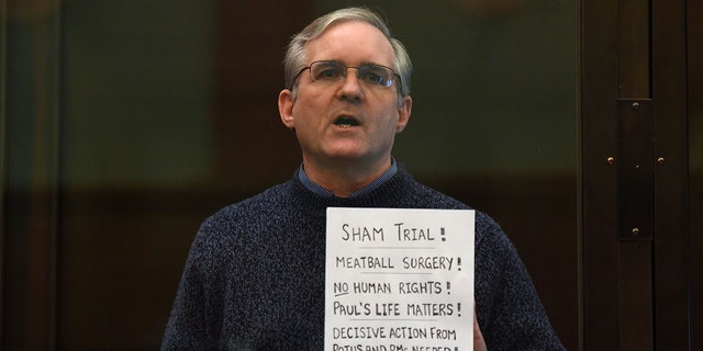 Paul Whelan, a former U.S. Marine accused of espionage and arrested in Russia in December 2018, stands inside a defendant's cage as he waits to hear his verdict on June 15, 2020. 