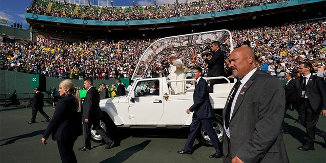 Pope Francis arrives to deliver an open air mass at Commonwealth Stadium, Tuesday, July 26, 2022, in Edmonton, Alberta. 