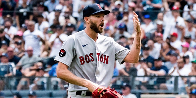 Boston Red Sox starting pitcher Chris Sale walks off the mound after a hand injury during the first inning of a game against the New York Yankees Sunday, July 17, 2022, in New York.