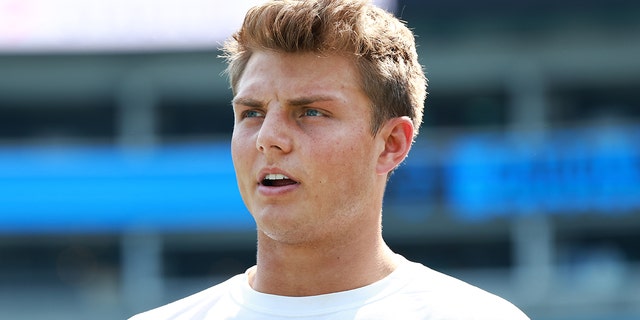 Zach Wilson, #2 of the New York Jets, looks on prior to the game against the Carolina Panthers at Bank of America Stadium on September 12, 2021 in Charlotte, North Carolina.