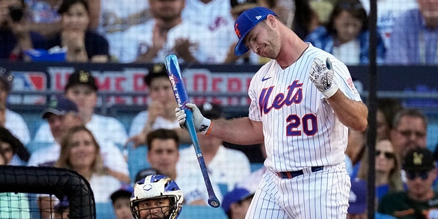 National League's Pete Alonso, of the New York Mets, reacts during the MLB All-Star baseball Home Run Derby, Monday, July 18, 2022, in Los Angeles.