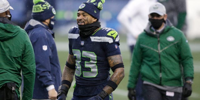 Seattle Seahawks' Jamal Adams smiles as he walks off the field after the team beat the New York Jets in an NFL football game, Sunday, Dec. 13, 2020, in Seattle. (AP Photo/Lindsey Wasson)