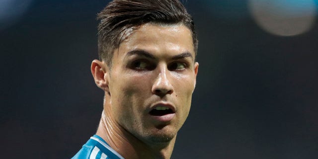 In this Sept. 18, 2019, file photo, Juventus' Cristiano Ronaldo looks back during a Champions League Group D soccer match in Madrid, Spain.