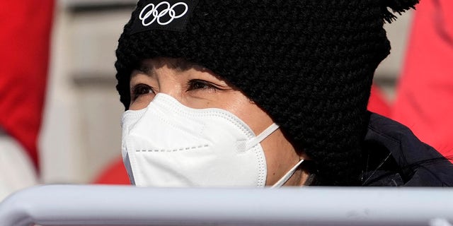 China's Peng Shuai watches the women's freestyle skiing big air finals at the 2022 Winter Olympics, Feb. 8, 2022, in Beijing.