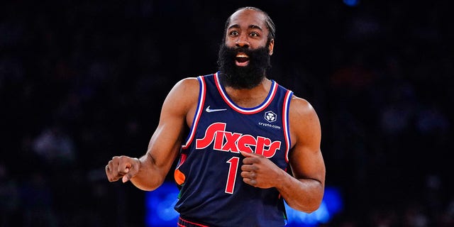 Philadelphia 76ers' James Harden (1) calls out to his teammate during the first half of an NBA basketball game against the New York Knicks Sunday, Feb. 27, 2022, in New York.