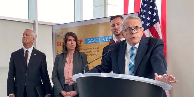 Gov. Mike DeWine discusses a law that gives school districts the option of arming trained school employees, on June 13, 2022, in Columbus, Ohio.